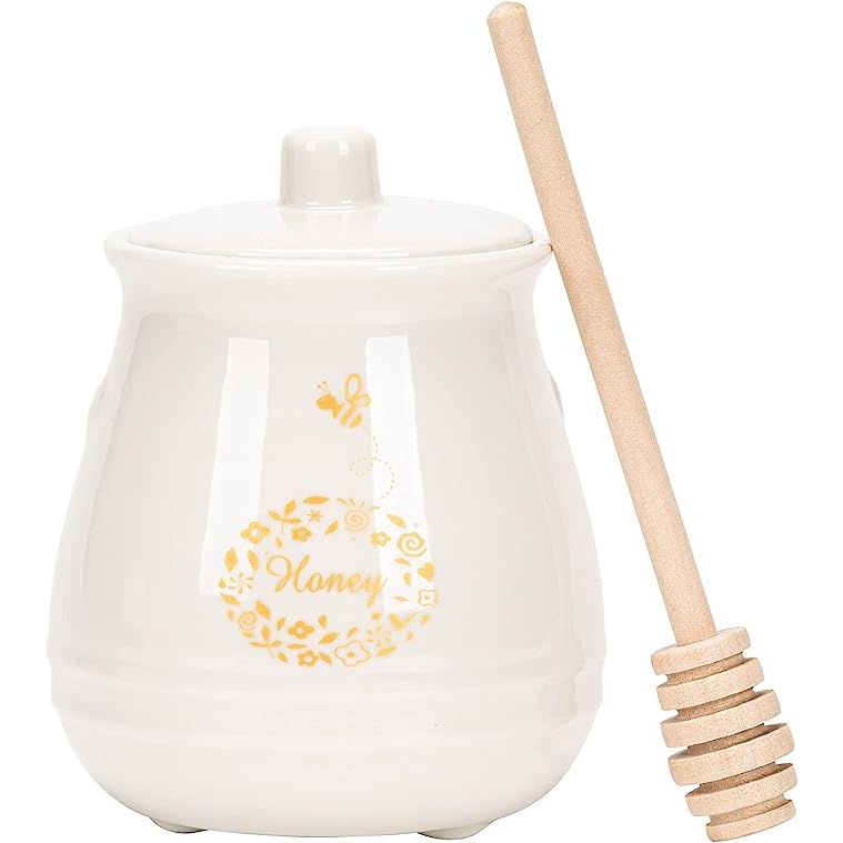 The KEKEHOME Ceramic Honey Pot with Lid and Wooden Dipper is an essential and delightful addition to any kitchen. Crafted from pristine white porcelain, this 12oz honey jar is equipped with a wooden dipper, allowing for effortless serving and access to delectable honey, syrup, jam, or jelly.