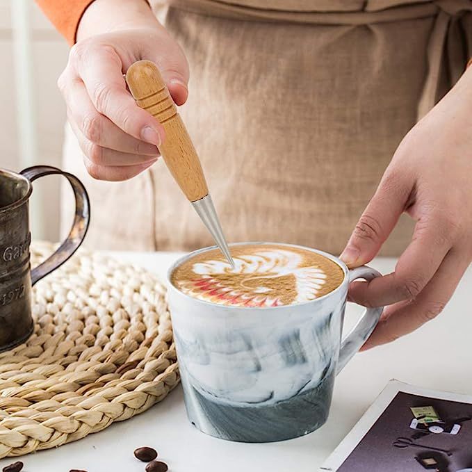 Introducing the Coffee Art Pen - the ultimate accessory for coffee enthusiasts looking to elevate their morning routine. This incredible household coffee spice needle allows you to unleash your creativity by crafting intricate designs on the foam of your latte or cappuccino. Impress your friends and family with your barista skills while enjoying a personalized and visually stunning cup of Joe.