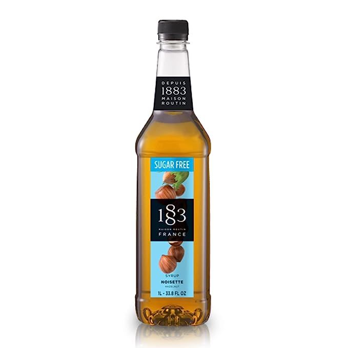 1883 Sugar Free Hazelnut Syrup is a flavored syrup designed to enhance the taste of hot and cold beverages. Its nutty flavor profile makes it a versatile addition to a wide range of drinks.
One of the standout features of this syrup is that it is completely sugar-free.