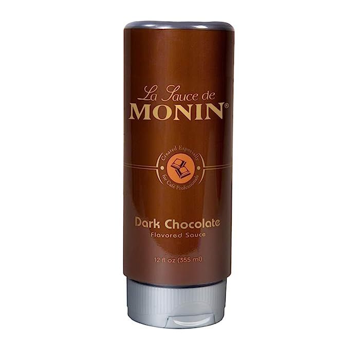 Monin's Gourmet Dark Chocolate Sauce is a luxurious and decadent syrup of the highest quality. With its velvety texture and rich flavor, it is the perfect addition to a wide range of treats, from desserts to coffee and snacks. What sets this sauce apart is its appeal to those with gluten sensitivities and a preference for non-GMO products.