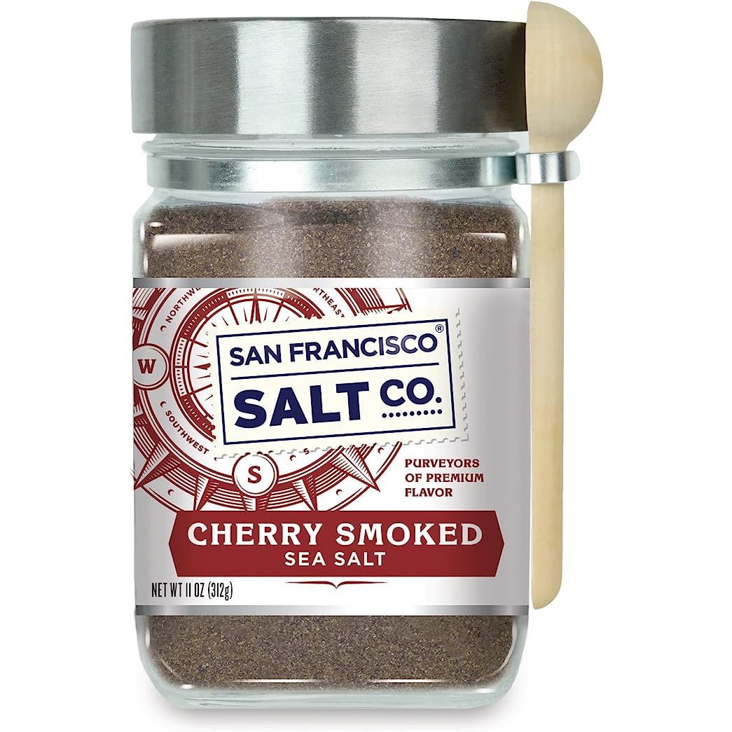 Cherrywood Smoked Sea Salt, crafted by the renowned San Francisco Salt Company, is a culinary delight that will elevate your dishes to new heights. This gourmet seasoning is meticulously produced using premium quality sea salt that is skillfully smoked with cherrywood, resulting in a truly unique and irresistible flavor.