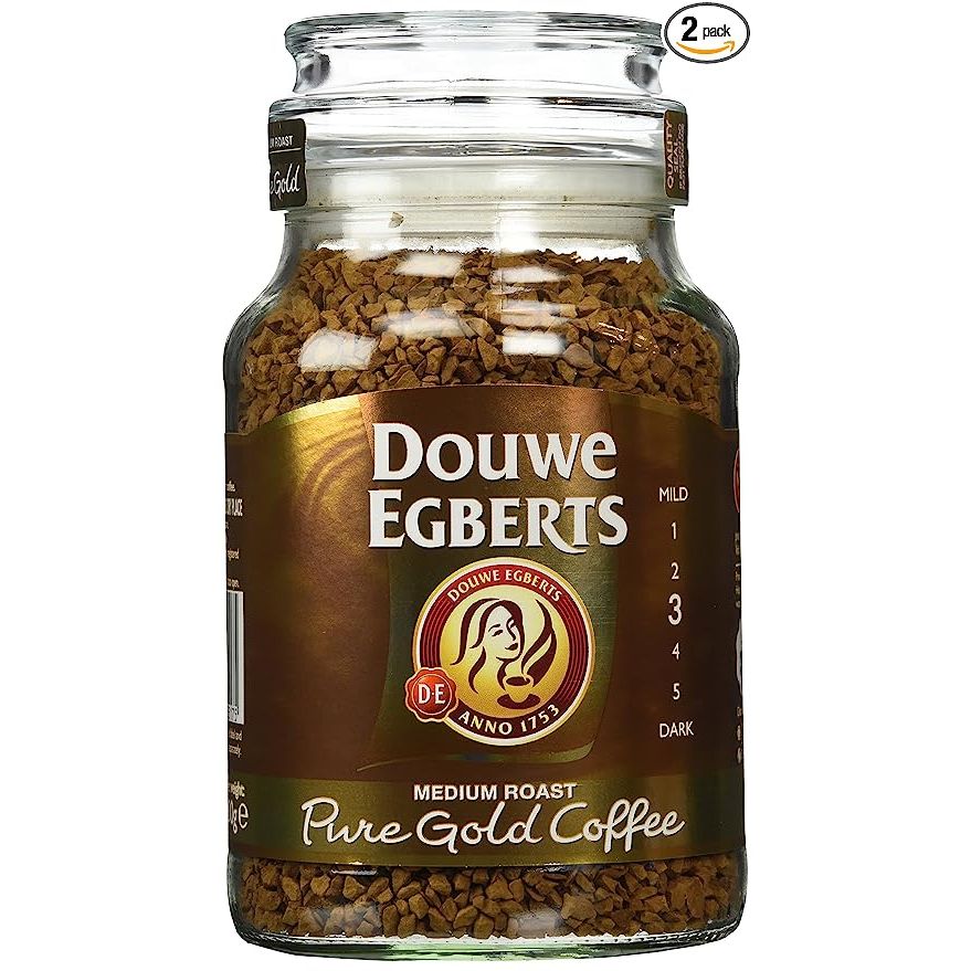 Experience the flavor of Douwe Egberts Pure Gold Instant Coffee, Medium Roast (Pack Of 2), a superior coffee blend that has garnered a loyal following worldwide. Crafted with utmost care and precision, this coffee is made from selectively sourced coffee beans that undergo expert roasting to achieve a delightful medium roast.