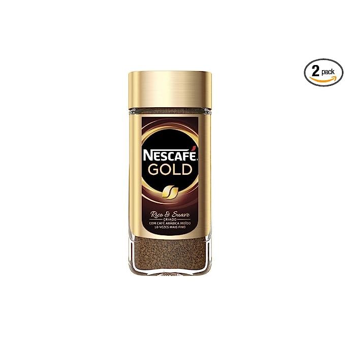 Introducing Nescafe Dark Roast Instant Coffee Gold 100g (2-pack), a premium coffee offering from Nestle, one of the world's most renowned beverage companies. Crafted with meticulously roasted coffee beans and natural ingredients, this product delivers a robust and indulgent flavor profile, accompanied by a velvety-smooth texture.

Coffee enthusiasts who crave a bold and intense taste without compromising on smoothness will find Nescafe Dark Roast Instant Coffee Gold 100g (2-pack) to be an absolute delight. Its convenience is unrivaled, making it an ideal choice for busy individuals and those who appreciate the simplicity of instant coffee.

With each 100g pack containing ample servings, this coffee option offers affordability without compromising on quality, making it an attractive choice for those seeking an indulgent beverage experience without breaking the bank. The 2-pack also ensures an extended supply of coffee to keep the pantry fully stocked for longer durations.

Preparing a satisfying cup of Nescafe Dark Roast Instant Coffee Gold 100g (2-pack) is effortless. Just add the desired amount of coffee to hot water or milk, give it a quick stir, and relish the delicious result. Enjoy this premium coffee blend at any time of day, invigorating your senses with its rich aroma and unparalleled taste.

Overall, Nescafe Dark Roast Instant Coffee Gold 100g (2-pack) is the ultimate choice for discerning coffee aficionados seeking a harmonious balance of robust flavor and convenience. Its budget-friendly price point and thoughtfully designed packaging make it a go-to option for indulging in a cup of high-quality coffee wherever and whenever you desire. Description by ChatGPT.