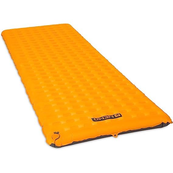 The NEMO Tensor Insulated Sleeping Pad (2022), Torch, Long Wide is a high-quality sleeping pad designed for outdoor enthusiasts who need a lightweight, yet comfortable and durable sleeping surface. The sleeping pad is named after its innovative "tensor" baffling technology, which minimizes air movement and creates a stable sleeping surface.