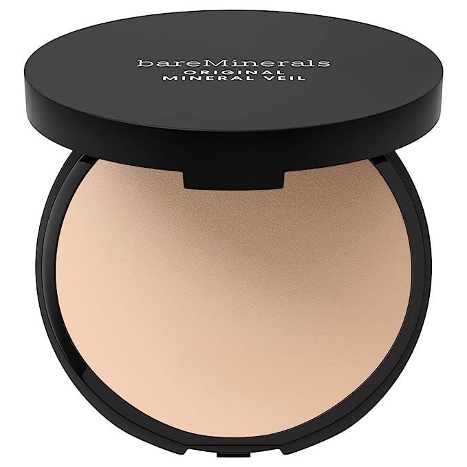 Achieve a radiant, airbrushed finish with the bareMinerals Original Mineral Veil Pressed Setting Powder in the stunning Topaz shade. Expertly crafted for all skin types, even the most sensitive, this luxurious compact powder combines the purity of natural minerals with the skin-soothing properties of botanical extracts.