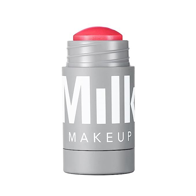 Infuse your beauty routine with the sheer magic of the MILK MAKEUUP's Lip + Cheek Cream Blush Stick Flip – your one-stop solution for a radiant pop of color on the fly. Revel in the dual-duty delight of this must-have cosmetic gem, which simplifies your makeup arsenal by doubling up as both a lip color and a cheek tint.