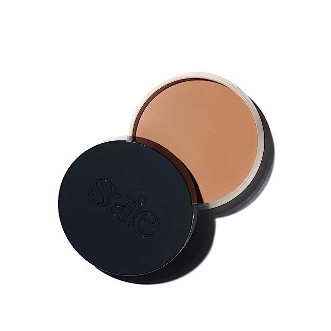 Infuse your beauty routine with the warmth of a golden hour glow using Saie Sun Melt Bronzer. This luxurious cream-balm is expertly crafted for seamless face sculpting and enlivening your natural beauty.