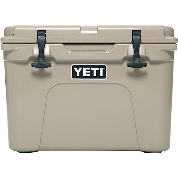 The YETI Tundra 35 Cooler is a highly popular and durable cooler designed to keep your food and beverages cold for extended periods of time. Made from a sturdy construction, this cooler is built to withstand tough conditions, whether you're out on a camping trip, tailgating, or enjoying a day out on the beach.