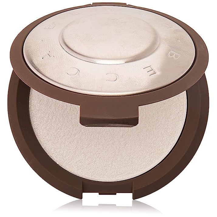 Elevate your glow game with Becca Shimmering Skin Perfector Pressed Highlighter in the ethereal shade of Pearl—a must-have for makeup aficionados and beauty newcomers alike. Packed in a convenient 0.25-ounce compact, this cult-classic highlighter promises a celestial, pearlized shimmer that breathes radiance and light into your skin.