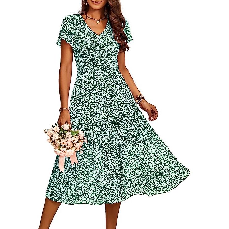 The dress features a stunning V-neckline, which adds a touch of sophistication and femininity to the overall look. The ruffle sleeves provide an extra flair and add volume to the upper body, giving a beautiful boho vibe. The leopard print pattern adds a trendy and fashionable element to the dress, making it perfect for both casual outings and more formal occasions.