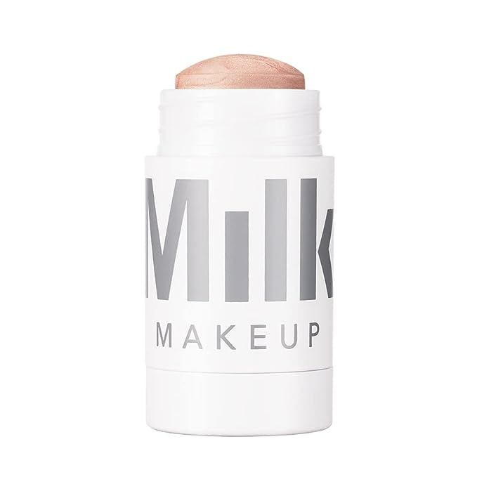 The Milk Makeup Mini Highlighter Stick in the shade "LIT - Champagne Pearl" is a popular cosmetic product known for its hydrating and pigmented cream formula. This versatile highlighter stick is vegan-friendly and packaged in a compact size of 0.21 ounces, making it perfect for on-the-go touch-ups and travel.