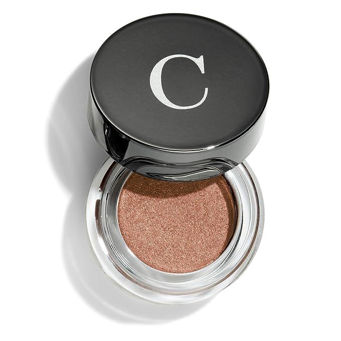 This product features a creamy and powdery texture, making it incredibly easy to apply. Its smooth formula glides effortlessly onto the skin, ensuring precise and flawless coverage. With exceptional adherence, this product offers long-lasting wear, ensuring your makeup stays in place throughout the day. Additionally, its richly pigmented hue delivers a beautiful metallic sheen, adding a touch of glamor to any look. Whether you're going for a bold and dramatic eye or a subtle shimmer, this product is perfect for creating a mesmerizing and eye-catching finish. Description by ChatGPT.