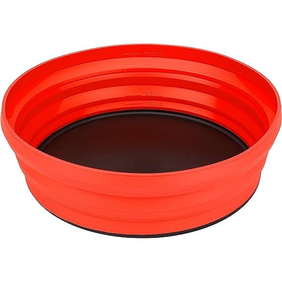 The Collapsible Bowl from Sea to Summit is a must-have for any outdoor enthusiast or backpacker. Made of food grade, heat-resistant silicone, this bowl is not only durable but also packs flat for easy storage in your backpack. Its nylon base is not only cut-resistant but also doubles as a convenient cutting board when flipped upside down.