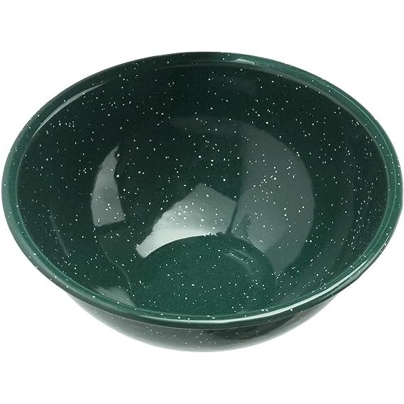 GSI Outdoors offers a versatile 6-inch mixing bowl in a vibrant green color that is sure to add a pop of freshness to any kitchen. This mixing bowl is designed to assist in various food preparation tasks, making it a valuable addition to your culinary tools.