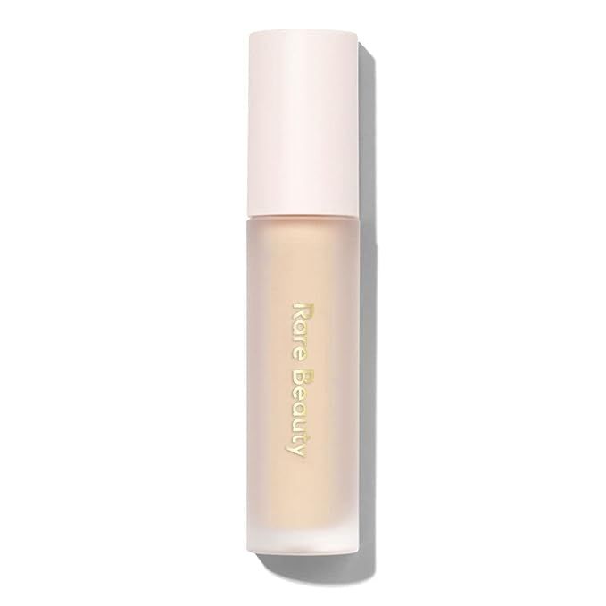 Elevate your eye makeup game with Rare Beauty's 'Always an Optimist Weightless Eye Primer'—a revolutionary product that's taking the beauty industry by storm. Crafted to provide the perfect base, this featherlight primer effortlessly preps your lids, delivering a seamless surface for any look.