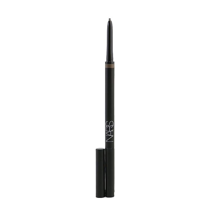 Transform your brow routine with the exquisite NARS Auburn Warm Moanda Brow Perfector—a must-have tool for immaculate, enduring brows. Tailored to complement red or auburn hair, this 0.1g precision brow pencil is your secret to adding rich dimension and natural definition to your arches. With its high-precision tip, you're in complete control to craft anything from a delicate everyday look to a strikingly bold silhouette. The Auburn Warm hue not just matches your hair color but enhances your facial features, while the smudge-proof formula guarantees an all-day polished appearance. 

Upgrade your beauty arsenal with the versatile and travel-friendly NARS Auburn Warm Moanda Brow Perfector. Conceived with the redhead's unique tones in mind, its warm auburn color ensures a seamless blend with your natural brow. Effortlessly fill in gaps and shape full, beautiful brows on the move thanks to the easy-to-apply pencil. Its glide-on application promises a full-bodied, refined finish that sticks with you—no touch-ups, no hassles. Embrace the confidence that comes with having professional, salon-worthy brows anytime, anywhere. 

Define and accentuate your brows to perfection with NARS Auburn Warm Moanda Brow Perfector, the ultimate game-changer for those coveting the perfect arch. Specifically formulated for those with fiery locks, this brow enhancer offers a harmonious match to add warmth and richness to your look. The expertly designed pencil delivers precise application for customized brow shapes, while the robust formula resists smudging and fading, delivering unwavering confidence. Whether seeking a soft, feathered effect or a dramatic, defined frame, this essential brow perfector is your steadfast companion for striking, resilient, and impeccably polished brows every single day.