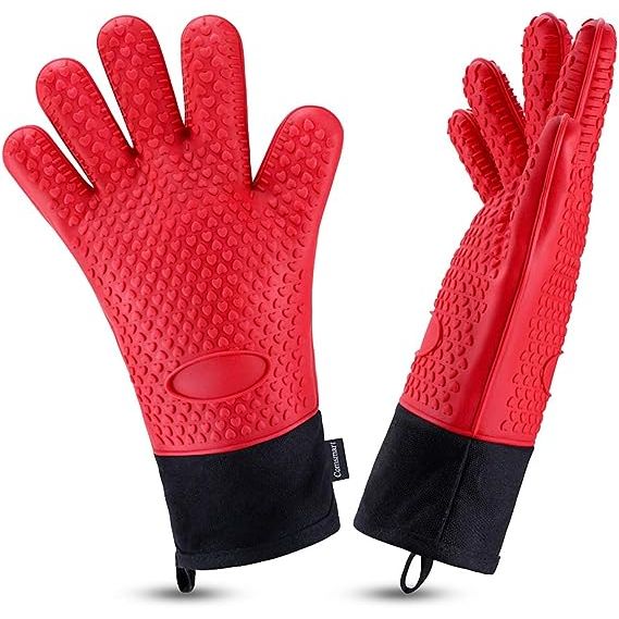 Introducing our Silicone Double-material Oven Gloves, the ultimate solution for ensuring both protection and comfort while handling hot objects. Designed by our team of experts, these gloves are crafted using a unique combination of heat-protective silicone on the outside and a soft cotton lining on the inside. With a remarkable temperature range f