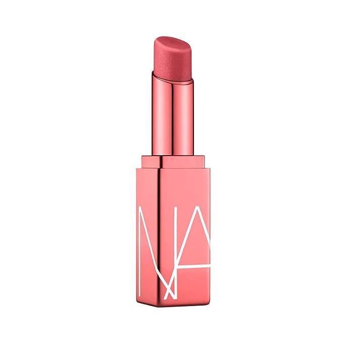 NARS' Afterglow Lip Balm, available in the shade "Dolce Vita," comes in a full-size compact containing 3 grams of product. This lip balm offers nourishment, hydration, and a hint of color for your lips.
Designed to deliver a natural, sheer tint, the NARS Afterglow Lip Balm in the Dolce Vita shade provides a universally flattering rosy hue.