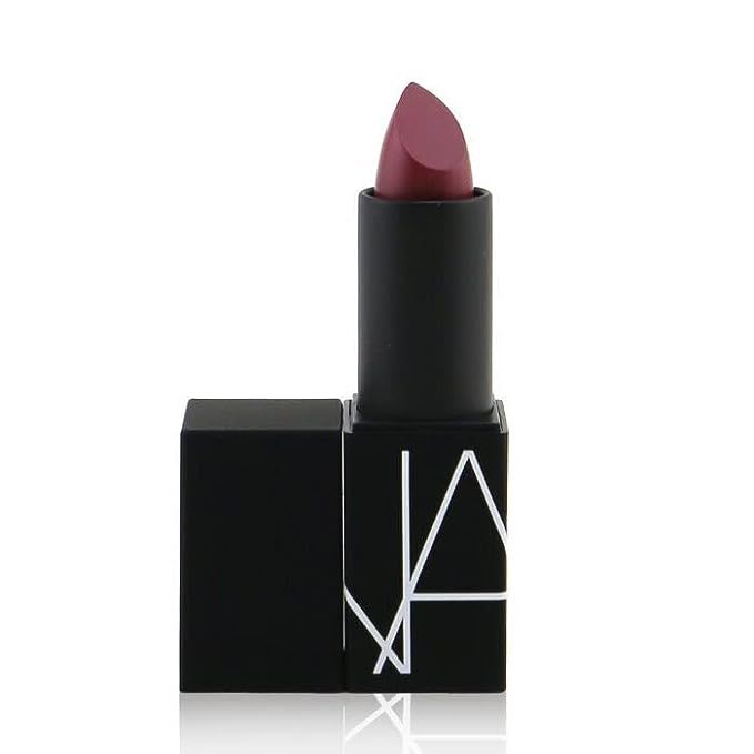 Afghan Red Satin Lipstick, the famous makeup brand NARS' offering, is a vibrant and alluring shade of red that can effortlessly elevate any makeup look. Packaged in a compact 0.12oz/3.5g bullet, this lipstick is designed for easy application and convenient on-the-go touch-ups.