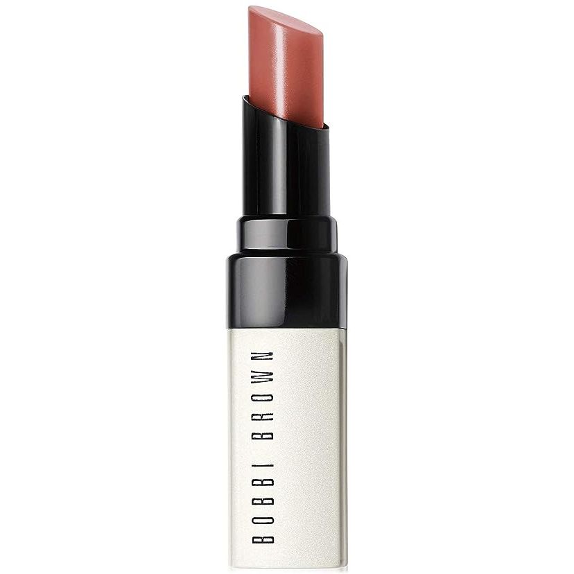 Unveil the secret to naturally beautiful lips with Bobbi Brown's EXTRA Lip Tint in Bare Nude – a best-selling, lightweight formula that graces your smile with a sheer touch of color. Glide into a realm of subtle elegance where your lip's innate charm is softly accentuated.