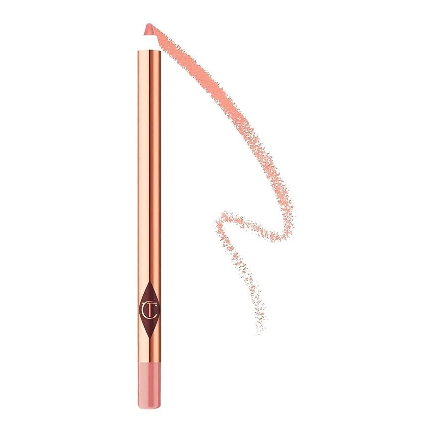 Elevate your lip game with the travel-friendly Charlotte Tilbury Pillow Talk Lip Cheat - a beauty kit staple for those who adore a full, natural-looking pout on the move. Lauded by beauty aficionados, this mini marvel is your secret weapon for sculpting a voluptuous lip contour that lasts. Its creamy texture married with a rich, pigmented hue allows for a seamless glide and a budge-proof barrier that ensures your lipstick won't stray. The travel-sized format puts the power of the much-loved Pillow Talk effect in your pocket, ready to perfect your smile anywhere, whether you're accentuating your natural lip line or crafting the canvas for a striking lipstick layer.

Jet-setters and purse-dwellers, rejoice! The Charlotte Tilbury Pillow Talk Lip Cheat in travel size is your ultimate on-the-go glam companion. Impeccably designed to complement any skin tone, its universally flattering nude pink shade infuses a dash of elegance into your daily makeup routine. Craft luxuriously soft and well-defined lips with a liner that promises compatibility with a myriad of lip shades, enhancing and personalizing your look to mirror your unique style. This tiny titan proves that powerful results can come from compact packages, keeping your lip artistry fresh and impeccable from dawn to dusk.

Never compromise on a luscious lip look with the Charlotte Tilbury Pillow Talk Lip Cheat travel size. It's more than just a liner—it's a celebration of the sultry, sought-after Pillow Talk signature style in the palm of your hand. Extend and refine your lips' silhouette with this dreamy tool that complements the full Pillow Talks range, from the lipstick that started it all to the sumptuous glosses. Apply with confidence, knowing its precision and endurance will support a swift, flawless application. Make room in your travel tote or clutch for this essential beauty asset, catering to the desires of makeup lovers keen on achieving that coveted Charlotte Tilbury Pillow Talk charm, anytime, anyplace.