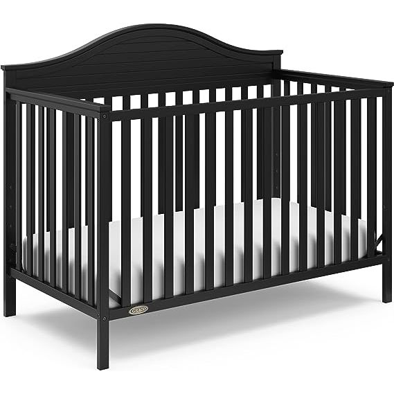 The Graco Stella 5-in-1 Convertible Crib is the perfect choice for parents looking for a versatile and stylish crib that will grow with their child. This sleek black crib offers five different configurations, catering to your child's evolving needs as they grow.