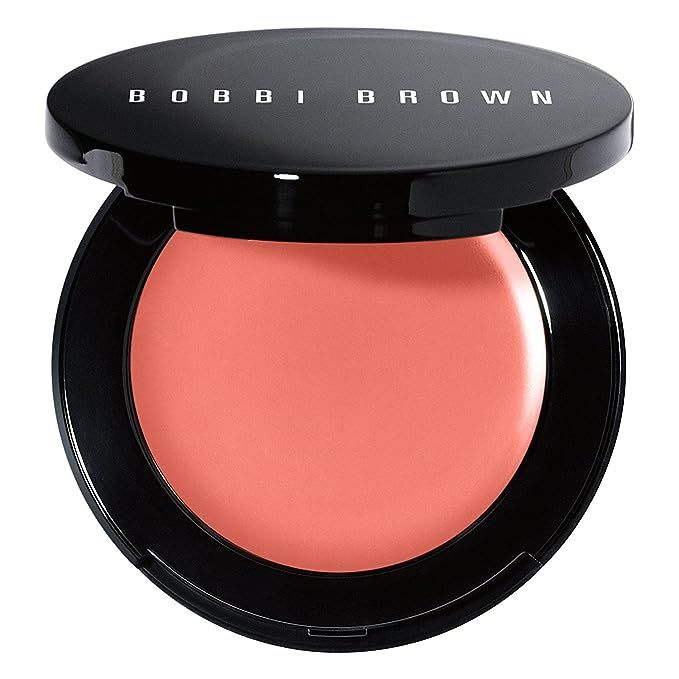 Unveil the secret to a naturally radiant glow with Bobbi Brown's multi-tasking Pot Rouge in the alluring 02 Calypso Coral, nestled in a sleek 0.13-ounce pot. This innovative, dual-purpose formula is your go-to for infusing lips and cheeks with a harmonious burst of warm, vibrant coral.