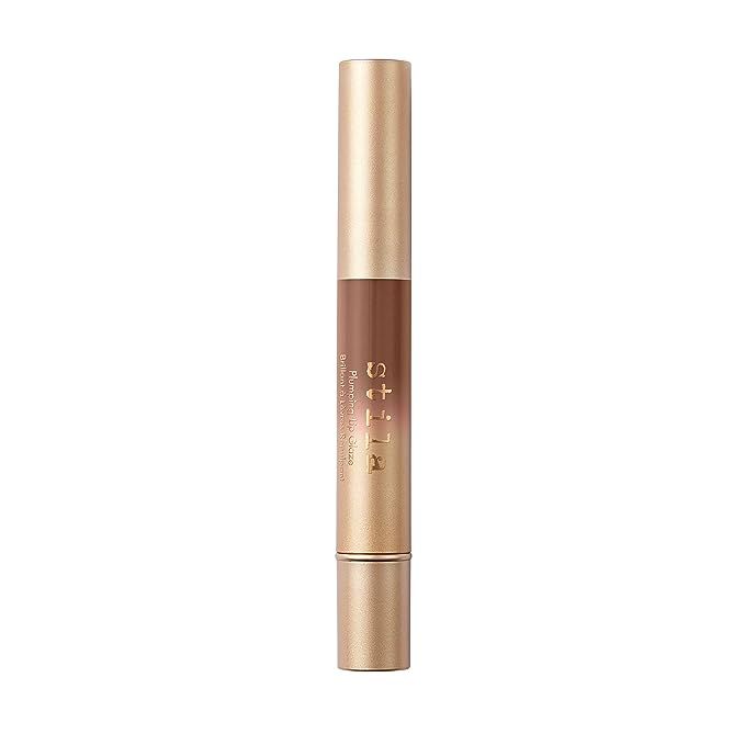 Unleash the secret to irresistibly full and luscious lips with Stila's Plumping Lip Glaze—a makeup marvel designed to give your pout an instant boost of volume. Infused with the lush benefits of hyaluronic acid, this gloss not only delivers a radiant, mirror-like finish but also wraps your lips in hydration.