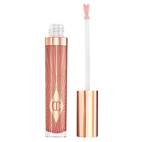 Unlock the secret to full, luscious lips with Charlotte Tilbury's Collagen Lip Bath in Rosy Glow! This exquisite lip enhancer offers a luxurious, plumping experience that turns your lip care routine into a spa-like indulgence.