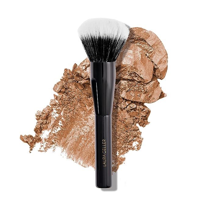 Achieve a picture-perfect finish with the sophisticated LAURA GELLER NEW YORK Full Face Powder Makeup Brush, crafted with an elegant wooden handle for the ultimate touch of luxury.