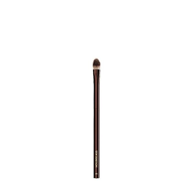 Achieve effortlessly flawless skin with the Hourglass Brush #5 - a makeup aficionado's dream tool for seamless concealer application. Meticulously crafted for precision, this brush is your secret weapon in concealing every imperfection and mastering the art of a perfect complexion.