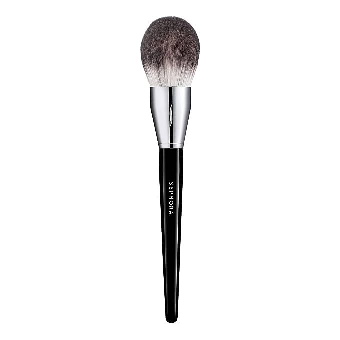 Discover the secret to a perfectly set face with the SEPHORA COLLECTION PRO Featherweight Powder Brush #91. Masterfully crafted for beauty enthusiasts and professional makeup artists alike, this premium-quality brush is your go-to for a seamless powder application. With its reputation for exceptional workmanship, the SEPHORA COLLECTION PRO line is synonymous with unparalleled performance, and this featherweight champion is no exception.

Experience unparalleled softness and superior product pick-up with the Featherweight Powder Triple 91. The meticulously engineered synthetic bristles are not only plush but also densely packed, ensuring a consistent and even application of your favorite powder cosmetics. These hypoallergenic fibers pamper your skin while providing the utmost hygiene during your beauty routine. Every sweep across your complexion feels like a touch of luxury, blending powders to perfection for an undetectable, airbrushed finish.

Designed to do more, the brush's dome-shaped, tapered head allows for versatility across a spectrum of powder products, including setting powders, highlights, contours, and blushes. Its intelligent design ensures targeted application in hard-to-reach areas, while the ergonomic handle sits comfortably in your hand, offering control and precision with every stroke. The SEPHORA COLLECTION PRO Featherweight Powder Brush #91 is not just a brush; it's a testament to enduring quality and the key to unlocking your makeup's full potential.