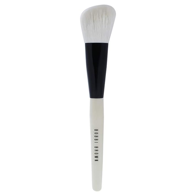 Transform your makeup routine with the premium Bobbi Brown Angled Face Brush - an essential beauty accessory for every woman. Designed for precision and versatility, this brush is a game-changer for those who love sculpting and refining their look with ease.