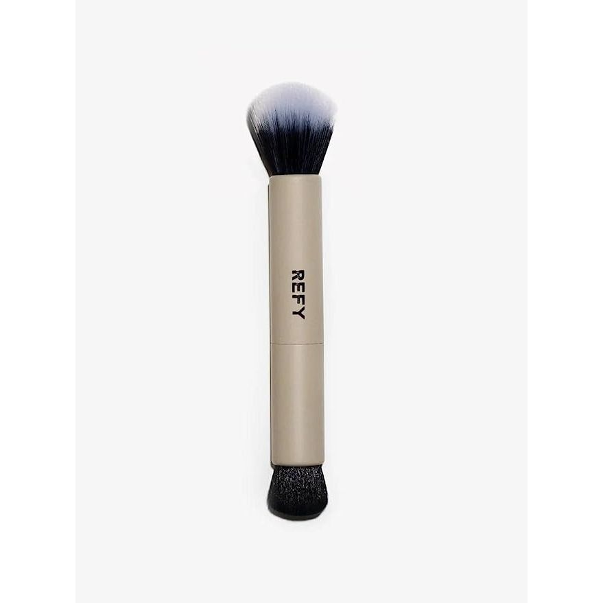 Elevate your beauty arsenal with the ingenious Refy Duo Brush, the ultimate 2-in-1 solution designed to streamline your beauty routine. Ideal for makeup enthusiasts and connoisseurs alike, this versatile brush is a statement of sophistication in both function and design.

Experience a perfectly polished complexion with the plush, high-quality bristles on one end of the Refy Duo Brush. These luxe fibers work with your favorite foundations, concealers, and powders, adapting to every contour of your face for an impeccable, airbrush-like finish. The brush's innovative design ensures a seamless blend, whether you're using liquid, cream, or powder makeup, allowing for a beautifully uniform canvas every time. On the flip side, the expertly crafted spoolie tames and shapes your eyebrows, transcending mere functionality to become the definitive tool for refined, elegant brows. The precise spoolie structure is optimal for combing, styling, and blending, ensuring each hair falls into place for that enviable, professional-grade definition.

Not only does the Refy Duo Brush deliver dual benefits, but it also boasts a stylish and robust build with an ergonomic handle for ultimate comfort and precision. Its compact, travel-friendly size means you can achieve a flawless look wherever you go. To preserve the integrity of this beauty essential, simple, regular maintenance is key. A deep cleanse with warm water and a gentle soap, followed by air drying, will maintain the Duo Brush’s efficacy and hygiene, ensuring that your skin stays radiant and clear.

Unleash the full potential of your makeup regimen with the Refy Duo Brush—a chic, effective, and indispensable tool that promises to perfect your complexion and brow game in one elegant stroke.