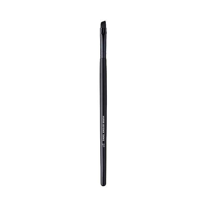 Elevate your makeup artistry with the must-have e.l.f. Studio Small Angled Brush, expertly crafted for impeccable precision. With its finely tuned design, this brush empowers you to master the art of the winged eyeliner and sculpted brows with unparalleled ease.