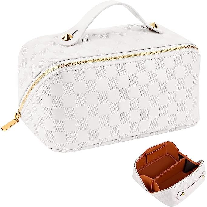 Elevate your beauty organization with the newly enhanced HUANLANG Travel Cosmetic Bag—an essential companion for every beauty aficionado in 2023. Boasting a sleek, modern grid design, this make-up bag provides superior organization, allowing quick and effortless access to your cherished beauty products.