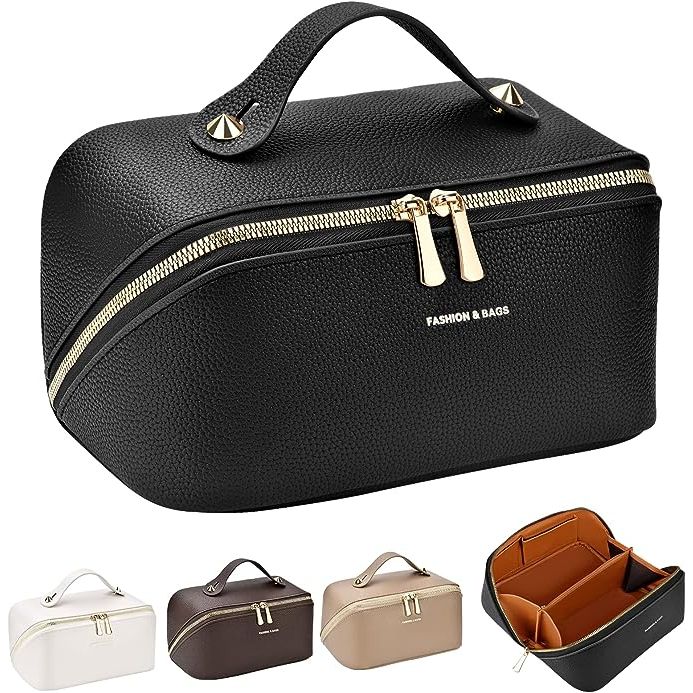 Elevate your travel game with the sleek HUANLANG 2023 Upgraded Portable Cosmetic Bag. Expertly crafted from premium PU leather, this chic and waterproof pouch safeguards your beauty investments with unparalleled ease.