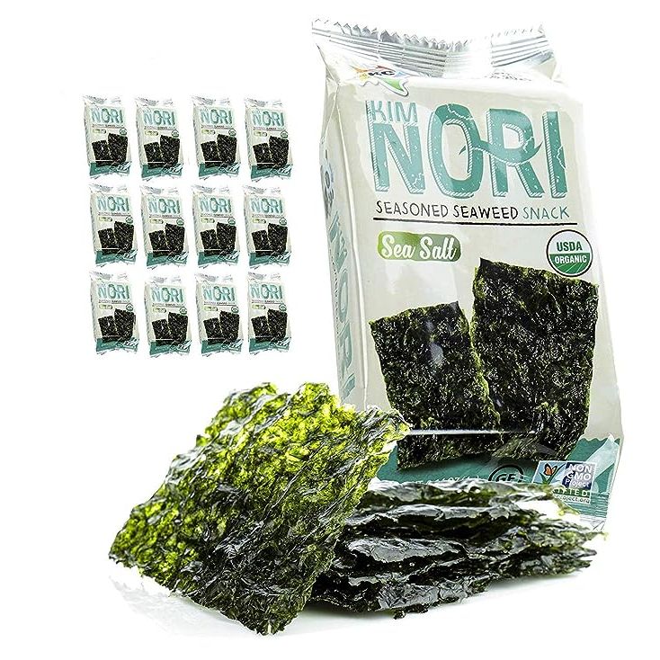 Experience the goodness of Organic Kimnori Seasoned Roasted Seaweed Snacks - a popular choice for health-conscious individuals. This delightful snack is made from high-quality organic seaweed, ensuring that you receive all the nutritional benefits without any harmful chemicals or additives. Each convenient 12-pack box contains 12 individual packs, 