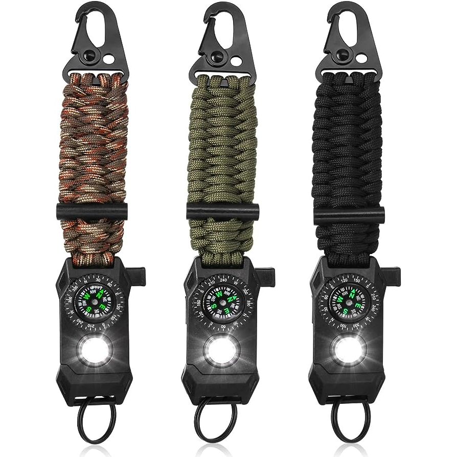 TACTICAL PARACORD BENEFIT: Experience unparalleled durability and strength with our keychain, constructed with military-grade paracord. Its robust and rope-like design not only ensures longevity but also doubles as a survival tool for any outdoor emergencies you may encounter. Prepare yourself for any situation with this essential accessory.