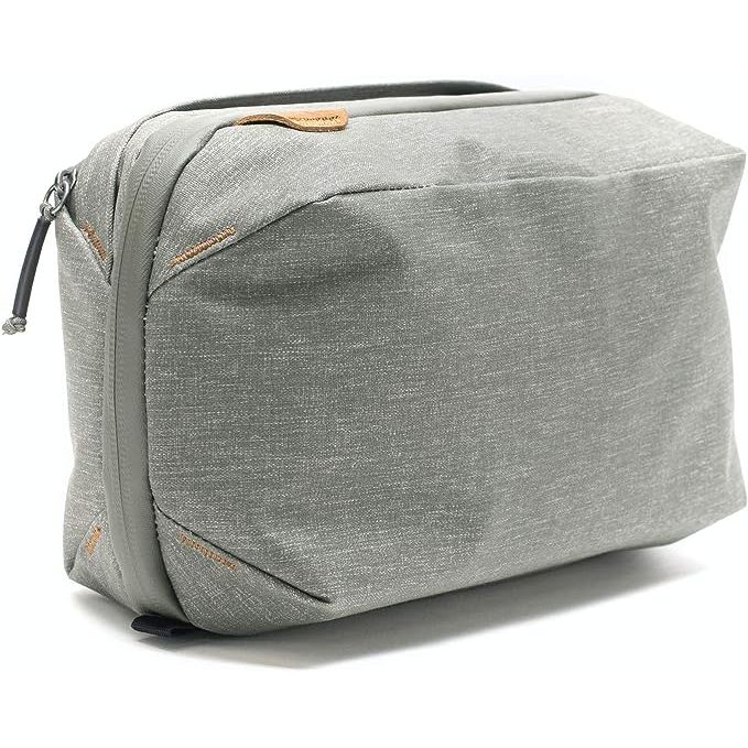 The polyester lining incorporated into this product ensures durability and helps protect the contents stored within. With a convenient zipper closure, accessing your belongings has never been easier. The bag is made with weatherproof 400D Nylon exterior fabric, ensuring its ability to withstand various weather conditions.