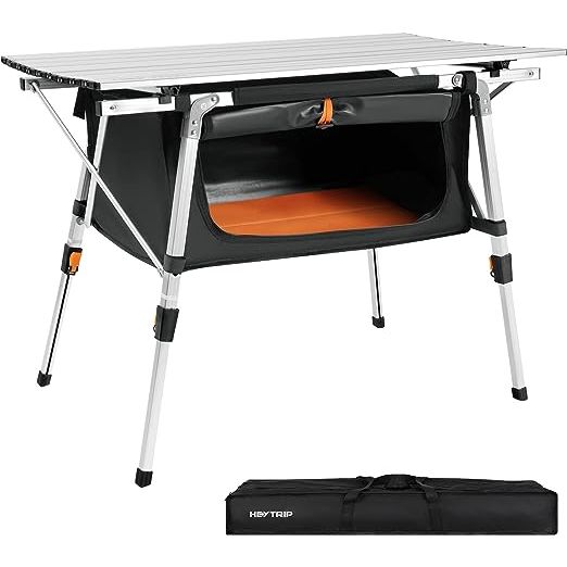 Introducing the HEYTRIP Folding Camping Table, the perfect companion for all your outdoor adventures. This table features a convenient storage layer with a baseboard and molle straps, providing ample space to organize and store all your essentials. From cooking supplies to snacks, cutlery, and even games, this table has got you covered. Plus, with 