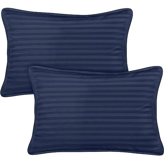 The Utopia Bedding Toddler Pillow is a high-quality bedding accessory specifically designed for toddlers. With a navy color, it comes in a convenient pack of two, providing value and versatility. 
Measuring 13x18 inches, these toddler pillows are perfectly sized to fit a toddler bed or for use while traveling.