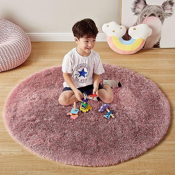 Introducing the GKLUCKIN Creative Kids Rug, the perfect addition to your child's room decor. This fluffy round rug features rich colors, adding a whimsical touch to the room and creating a personalized theme that your little ones will love. Made from eco-friendly and non-toxic materials, this rug is designed with your child's safety in mind.