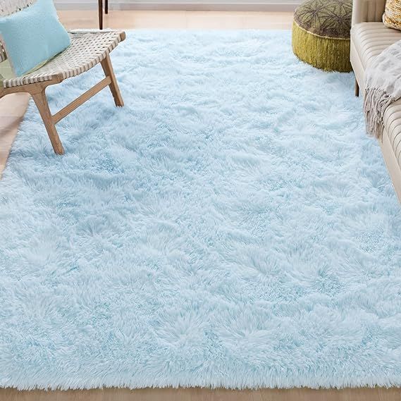 Introducing our modern and versatile area rug, designed to enhance the comfort and style of your bedroom and medium traffic areas. With its furry appearance and soft texture, this rug offers the flexibility you need.