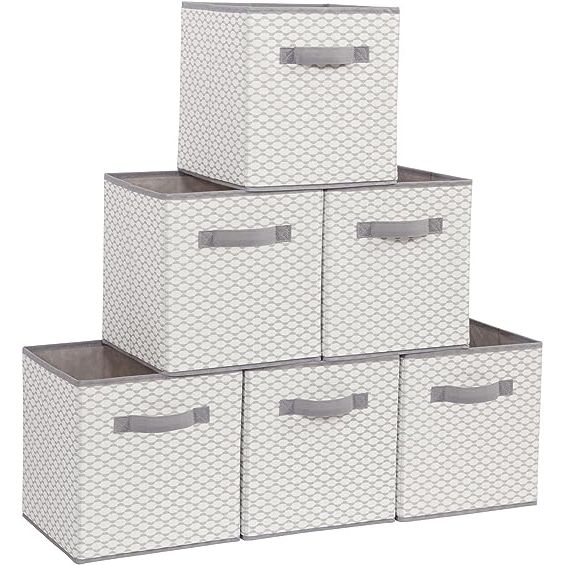 Introducing our durable and sturdy 6 pack stable storage cubes. Made with high quality fabric and 2 mm thick board, these storage cubes are built to last and are perfect for organizing your items. Each box is equipped with a wide handle and can hold up to 11 lbs, ensuring that your belongings are securely stored.