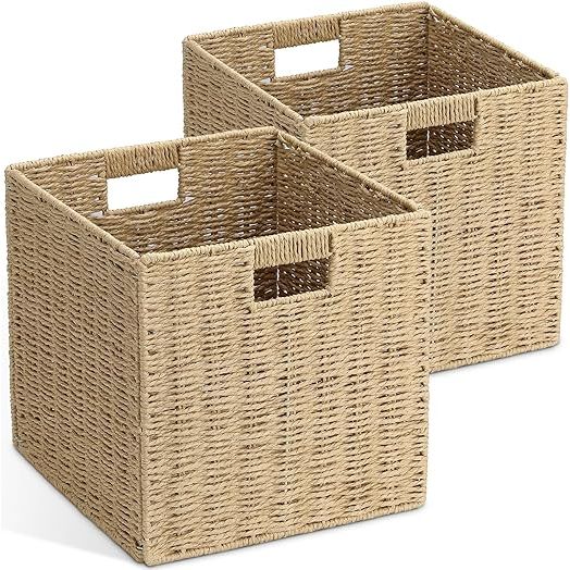 Introducing our high-quality and durable storage basket, designed to meet your organizational needs. Made with a sturdy metal frame and renewable round paper rope, this basket is built to last. Its reinforced handle can carry items weighing up to 50 lbs without bending, making it easy to transport your belongings.