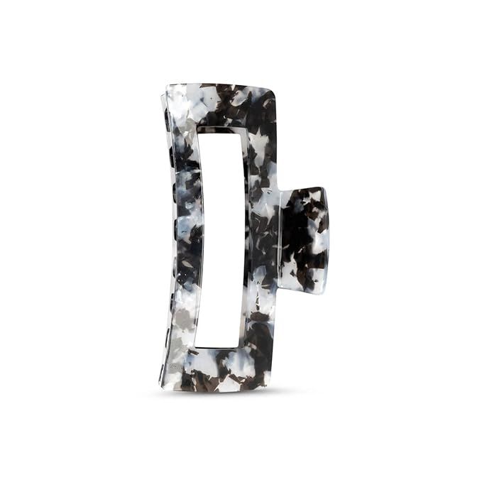 Elevate your everyday style with Kitsch Jumbo Claw Clips for Hair! These fashionable hair accessories are perfect for holding back unruly hair and come in a variety of colors to suit any aesthetic. Made from durable recycled plastic, these extra-large claw clips are specifically designed for thick hair.