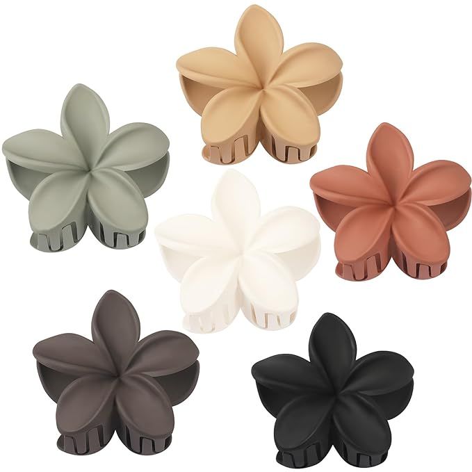 Introducing the trendy and functional Hawaii Style Flower Claw Clips! These adorable clips are not only aesthetically pleasing, but also serve a purpose. Whether you're on vacation or going about your daily routine, these clips will securely hold your hair in place while you clean your face, bathe, make up, cook, do chores, or work.