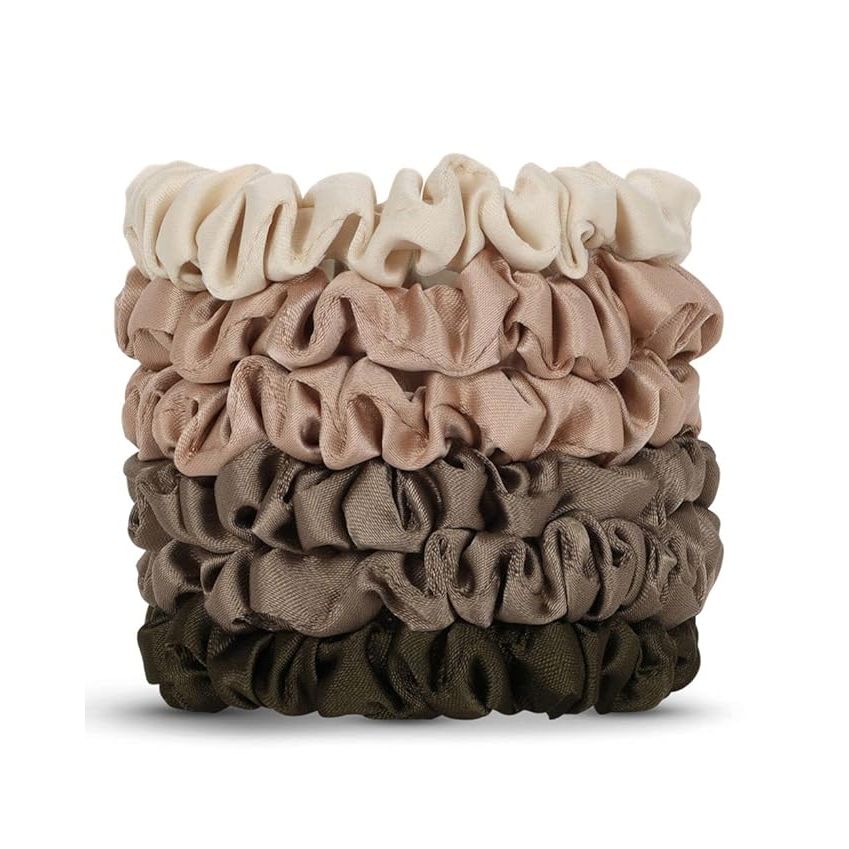 Introducing our Smooth Satin Elastic Scrunchies, the perfect hair accessory for keeping your hair healthy and strong. Made with high-quality satin, these scrunchies are softer than silk and gentle on your hair, preventing breakage, frizz, ponytail bumps, and split ends.
