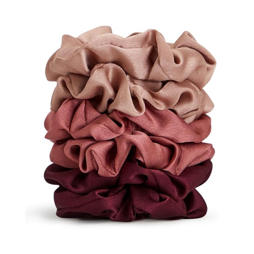 The Kitsch Satin Scrunchies for women are the perfect accessory to ensure a comfortable and restful night's sleep. Made from breathable fabric, these scrunchies are soft and comfortable, providing a secure hold without pulling or tugging on your delicate strands.